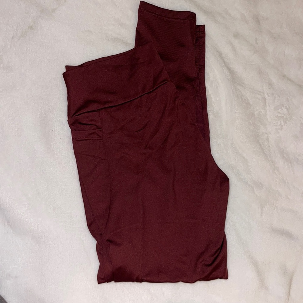 Red Polyester Leggings w/ Pocks and sheer spots on leg, Size S